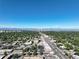 Expansive aerial view shows streetscapes and city skyline at 1473 N Locust St, Denver, CO 80220