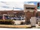 Exterior view of the Safeway storefront shows signage and parking at 1473 N Locust St, Denver, CO 80220