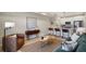 Cozy living room with an open kitchen, modern decor, and lots of natural light at 1473 N Locust St, Denver, CO 80220