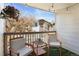 Cozy balcony with seating area, offering a relaxing outdoor space with pleasant views at 8615 W Berry Ave # 203, Littleton, CO 80123