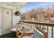 Charming balcony with chairs and table, perfect for enjoying the outdoors at 8615 W Berry Ave # 203, Littleton, CO 80123