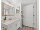 Updated bathroom with vanity, new fixtures, and ample storage at 8615 W Berry Ave # 203, Littleton, CO 80123