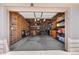Open garage space offering parking and ample storage at 8615 W Berry Ave # 203, Littleton, CO 80123
