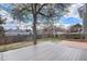 The large backyard features a deck and a spacious lawn at 17802 E Bates Ave, Aurora, CO 80013