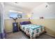 A charming bedroom with a bright window and cheerful decor at 17802 E Bates Ave, Aurora, CO 80013