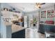 Open kitchen featuring stainless steel appliances, granite countertops, and a bright, open layout at 17802 E Bates Ave, Aurora, CO 80013