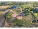 Aerial view highlighting the community park featuring baseball diamonds and open green spaces at 9787 W Ohio Ave, Lakewood, CO 80226