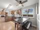 Cozy kitchen with casual dining and a window overlooking the backyard at 9787 W Ohio Ave, Lakewood, CO 80226