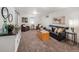 Cozy living room with ample seating, stylish decor, and soft lighting at 9787 W Ohio Ave, Lakewood, CO 80226
