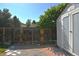 Backyard features gate access, storage shed and established trees at 21518 E Powers Ln, Centennial, CO 80015