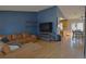 Inviting living room featuring hardwood floors, stylish furnishings, and an open concept design at 21518 E Powers Ln, Centennial, CO 80015