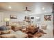 Spacious finished basement with a comfortable seating, bar, and stylish decor at 15776 Native Willow Dr, Monument, CO 80132
