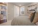 Inviting bedroom with serene decor, featuring a comfortable bed and ample natural light at 15776 Native Willow Dr, Monument, CO 80132