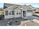 Beautiful home with stone accents, landscaping, and driveway leading to a garage, presenting an inviting curb appeal at 15776 Native Willow Dr, Monument, CO 80132