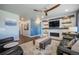 Stylish living room featuring modern furnishings, a fireplace, and elegant decor at 15776 Native Willow Dr, Monument, CO 80132