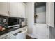 Stylish office space with custom cabinetry, and built-in desk at 15776 Native Willow Dr, Monument, CO 80132