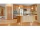Modern kitchen featuring stainless steel appliances, granite countertops and a center island at 16231 Rayburn St, Hudson, CO 80642