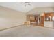 Comfortable living room flowing into the kitchen, offering natural light and an airy feel at 16231 Rayburn St, Hudson, CO 80642