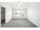 Spacious bedroom with plush carpet and natural light at 6193 Terry Ct, Arvada, CO 80403