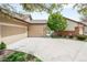 Charming home featuring a spacious driveway and well-maintained landscaping at 6193 Terry Ct, Arvada, CO 80403