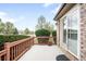 This patio offers a relaxing outdoor space with brick accents and mature landscaping at 6193 Terry Ct, Arvada, CO 80403