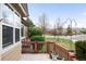 Enjoy serene outdoor living on this charming patio surrounded by lush greenery and neighborhood views at 6193 Terry Ct, Arvada, CO 80403