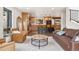 Relaxing living room and open kitchen layout, great for entertaining and everyday living at 6640 Kilimanjaro Dr, Evergreen, CO 80439