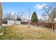 View of the yard featuring a walkway, shed, and fence at 9415 Osceola St, Westminster, CO 80031