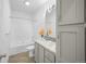 Neat bathroom with a bathtub and shower combo and a single vanity with neutral color tones at 6 Timberlake Ct, Byers, CO 80103