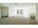 Bright and open-concept floor plan combining the living area and kitchen at 6 Timberlake Ct, Byers, CO 80103