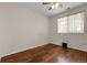 Cozy bedroom with hardwood floors and a window offering natural light at 337 Ivory Cir, Aurora, CO 80011