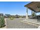 Picturesque backyard featuring a gazebo, covered patio, and lush landscaping, ideal for outdoor enjoyment at 171 S Waterloo St, Aurora, CO 80018