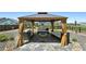Beautiful backyard gazebo with comfortable seating and a fire pit, perfect for relaxing and entertaining at 171 S Waterloo St, Aurora, CO 80018