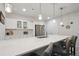 Bright kitchen with white cabinets, stainless steel appliances, and a large center island at 171 S Waterloo St, Aurora, CO 80018