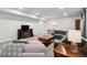 Spacious living room with plush sofas, a coffee table, and a media console at 171 S Waterloo St, Aurora, CO 80018