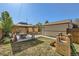 Backyard view showcases a charming gazebo, outdoor seating, and a play area for children at 2901 N Glencoe St, Denver, CO 80207