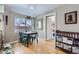 Bright dining room with hardwood floors and ample natural light at 2901 N Glencoe St, Denver, CO 80207