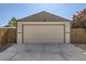 Spacious detached garage with a large door and freshly painted exterior at 2901 N Glencoe St, Denver, CO 80207