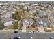 An aerial view of a well-maintained two-story home with a landscaped yard in a desirable neighborhood at 20271 E Lake Ave, Centennial, CO 80016