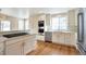 Bright kitchen features stainless steel appliances, a gas stovetop, and a seamless transition to the dining area at 20271 E Lake Ave, Centennial, CO 80016