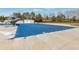 An in-ground pool covered for the off-season, and a slide provides outdoor community fun at 20271 E Lake Ave, Centennial, CO 80016