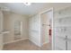 Walk-in closet featuring wire shelving for functional storage, a mirror and connection to the bathroom at 20271 E Lake Ave, Centennial, CO 80016