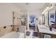 A full bathroom featuring a bathtub, shower, and a double sink vanity with granite countertops at 5350 Clearbrooke Ct, Castle Rock, CO 80104