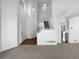 Welcoming two-story entryway featuring wood floors and a staircase at 10707 Milliken St, Parker, CO 80134