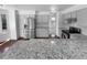Modern kitchen featuring stainless steel appliances, granite countertops and hardwood floors at 10707 Milliken St, Parker, CO 80134