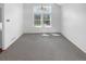 Bright living room features a large window overlooking the backyard at 10707 Milliken St, Parker, CO 80134
