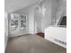 A spacious living room with many windows and a tall ceiling at 10707 Milliken St, Parker, CO 80134