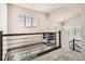 Unique loft area featuring a hammock overlooking the lower level and large windows at 15437 W 95Th Ave, Arvada, CO 80007