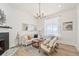 Bright living room with hardwood floors, fireplace, and modern decor at 300 N Inca St, Denver, CO 80223