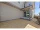A view of the backyard featuring a sliding glass door entry and straw at 21044 E 63Rd Dr, Aurora, CO 80019